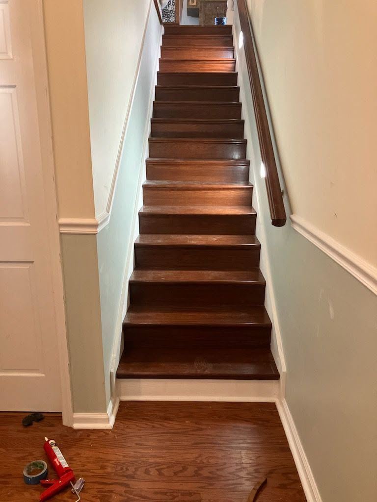 Completed hardwood interior staircase renovation